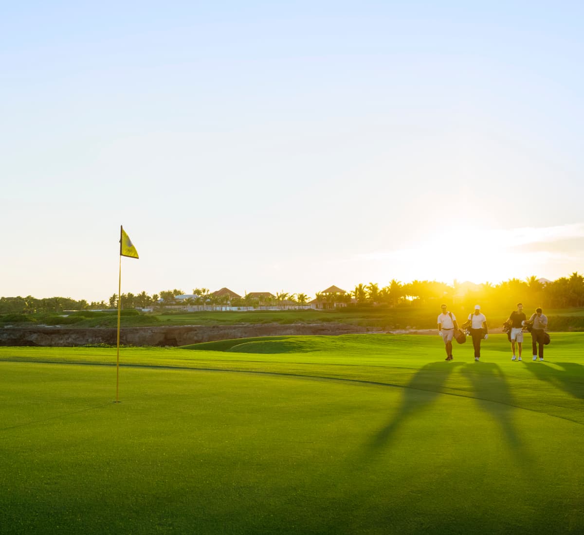 Golfers walking to green