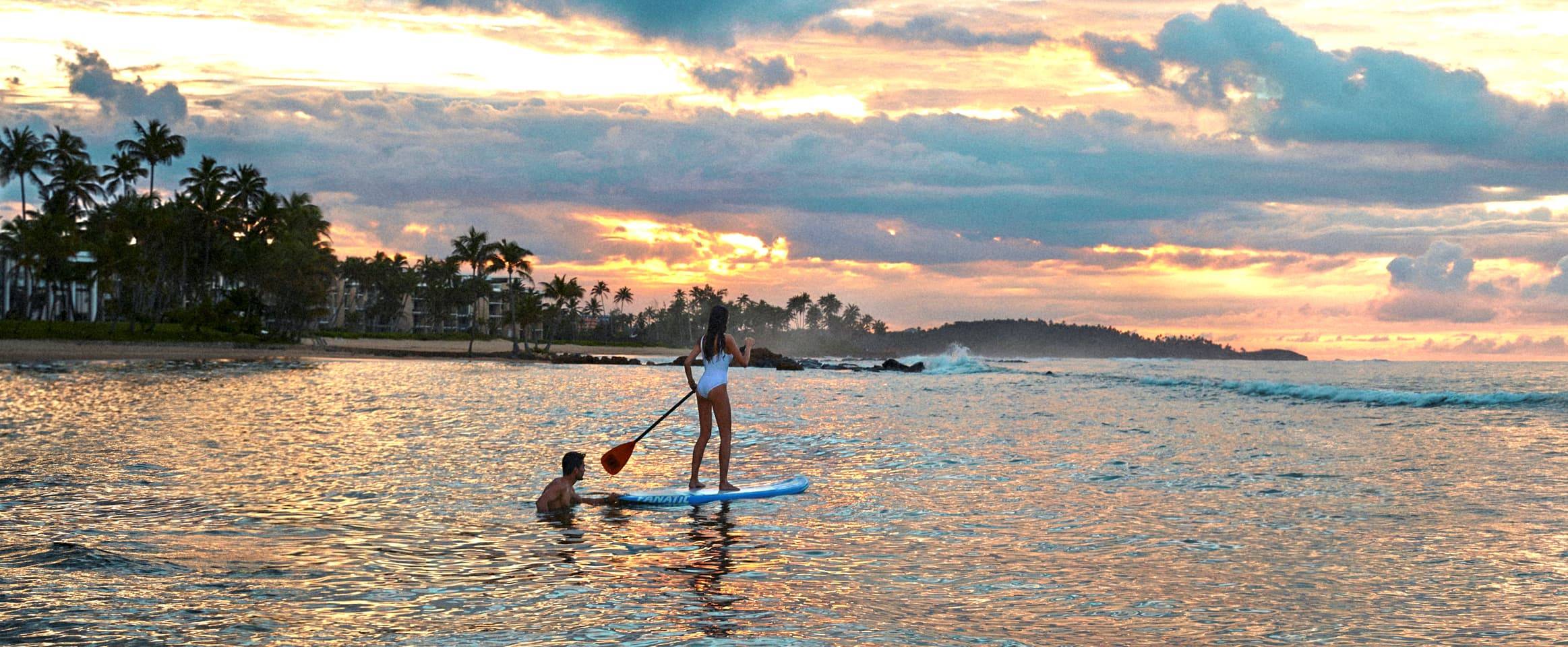 Paddle boarding on private beach