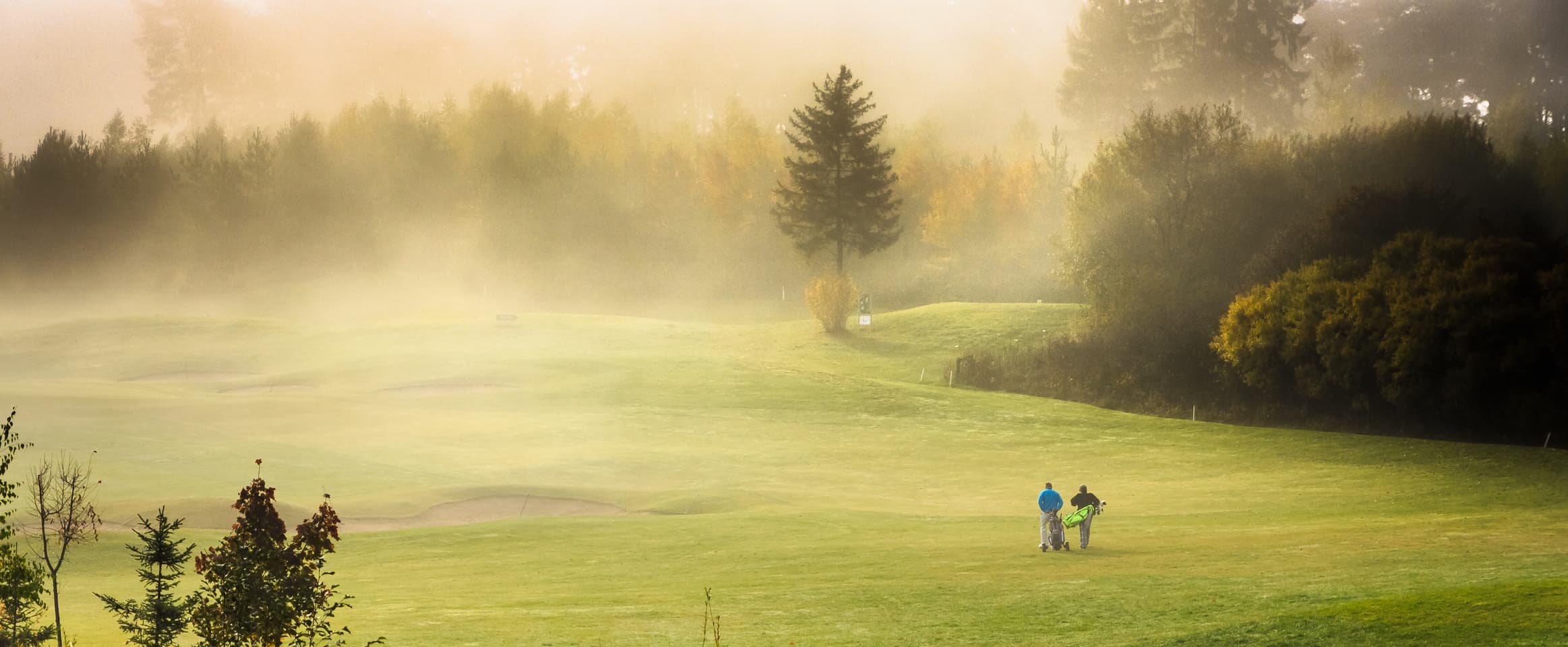 Golfers on a luxury golf course