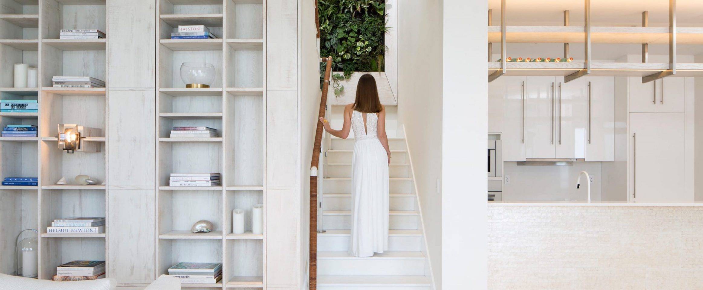 Residence owner walking up steps